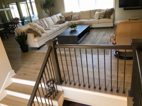 White oak hardwood floor through an open-plan living space